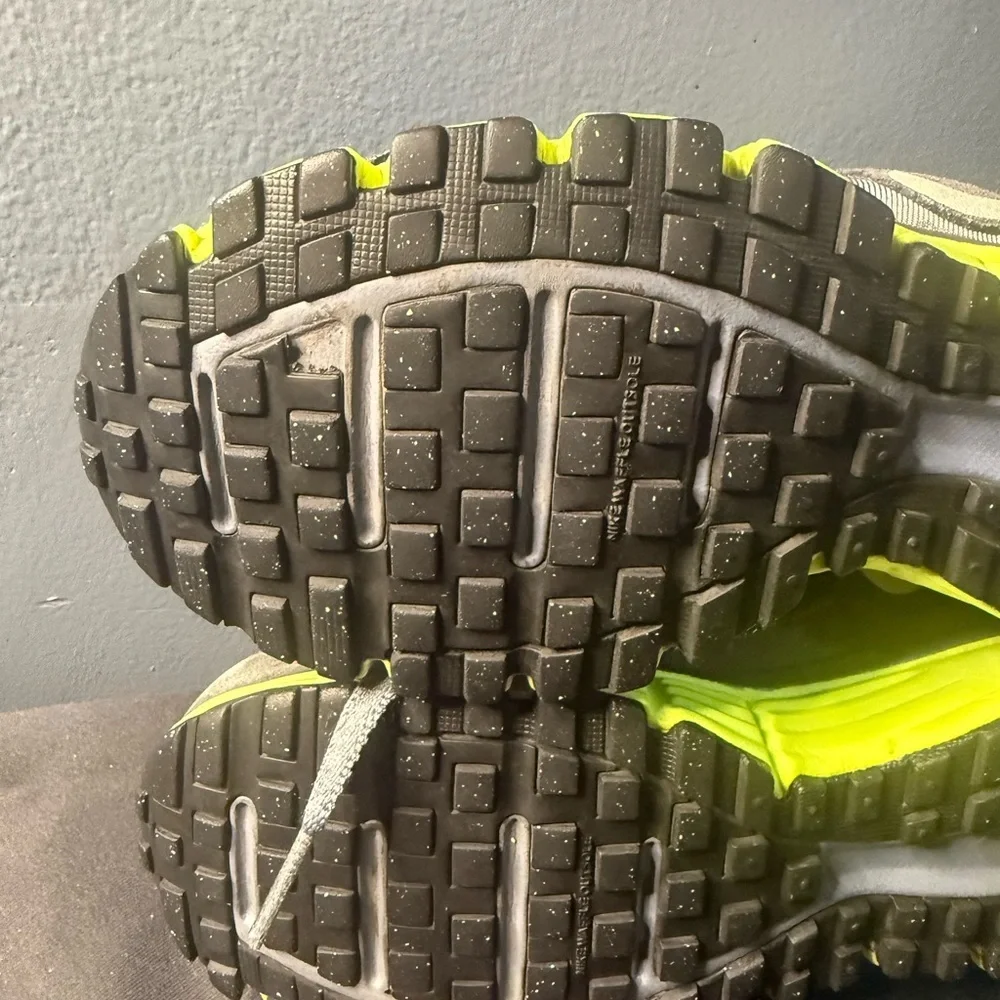 Nike women’s Gray and Neon Green Dual Fusion Sneakers